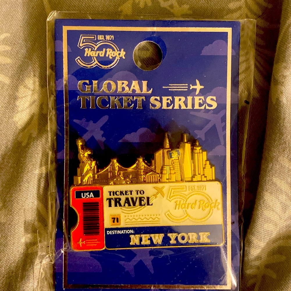 Brand new in packaging. Hard Rock Cafe Global Ticket Series Pin